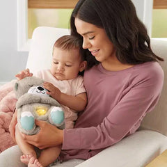 Meda koji spava diše svetli i svira uspavanke